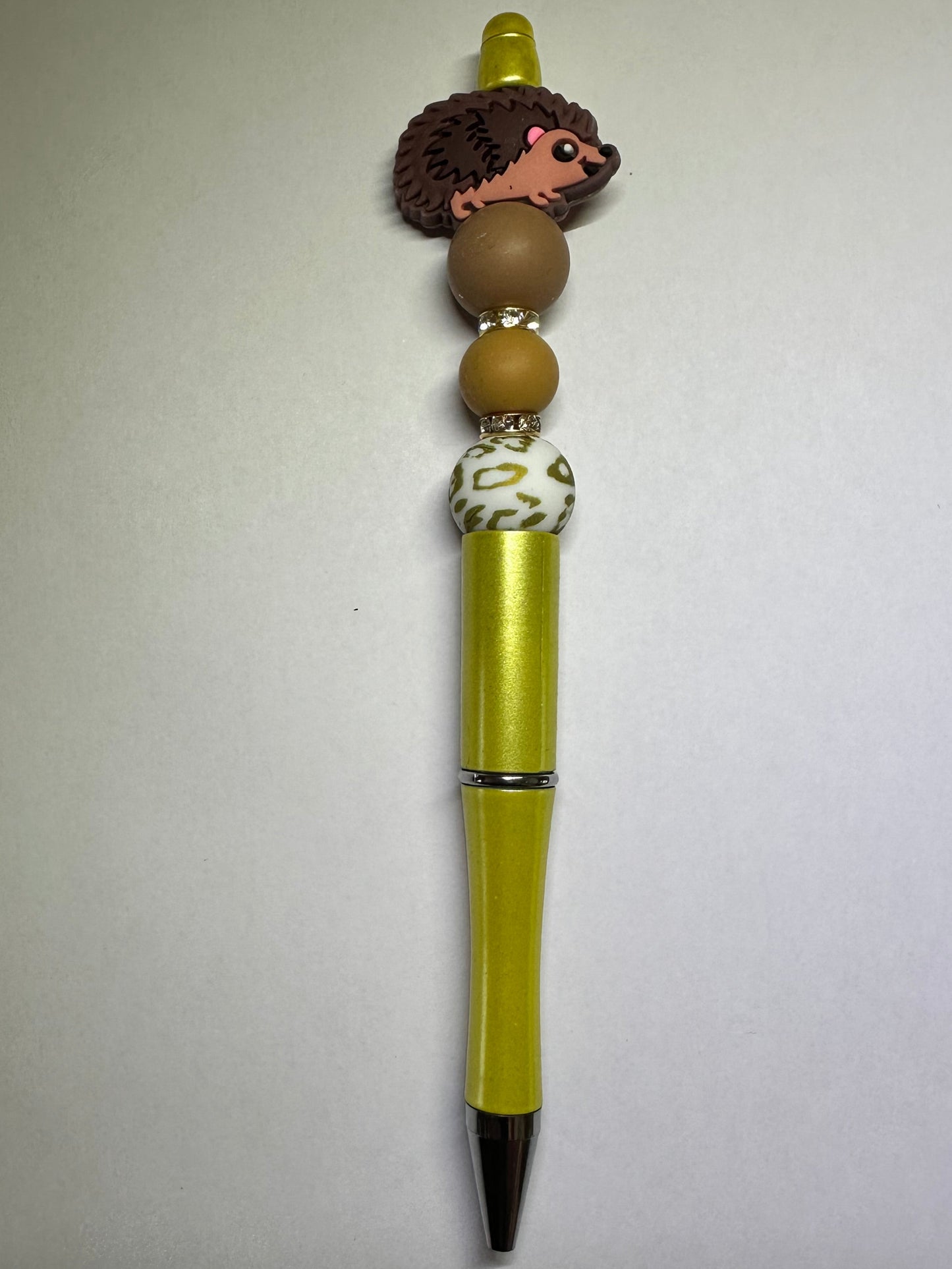 Gold hedgehog pen