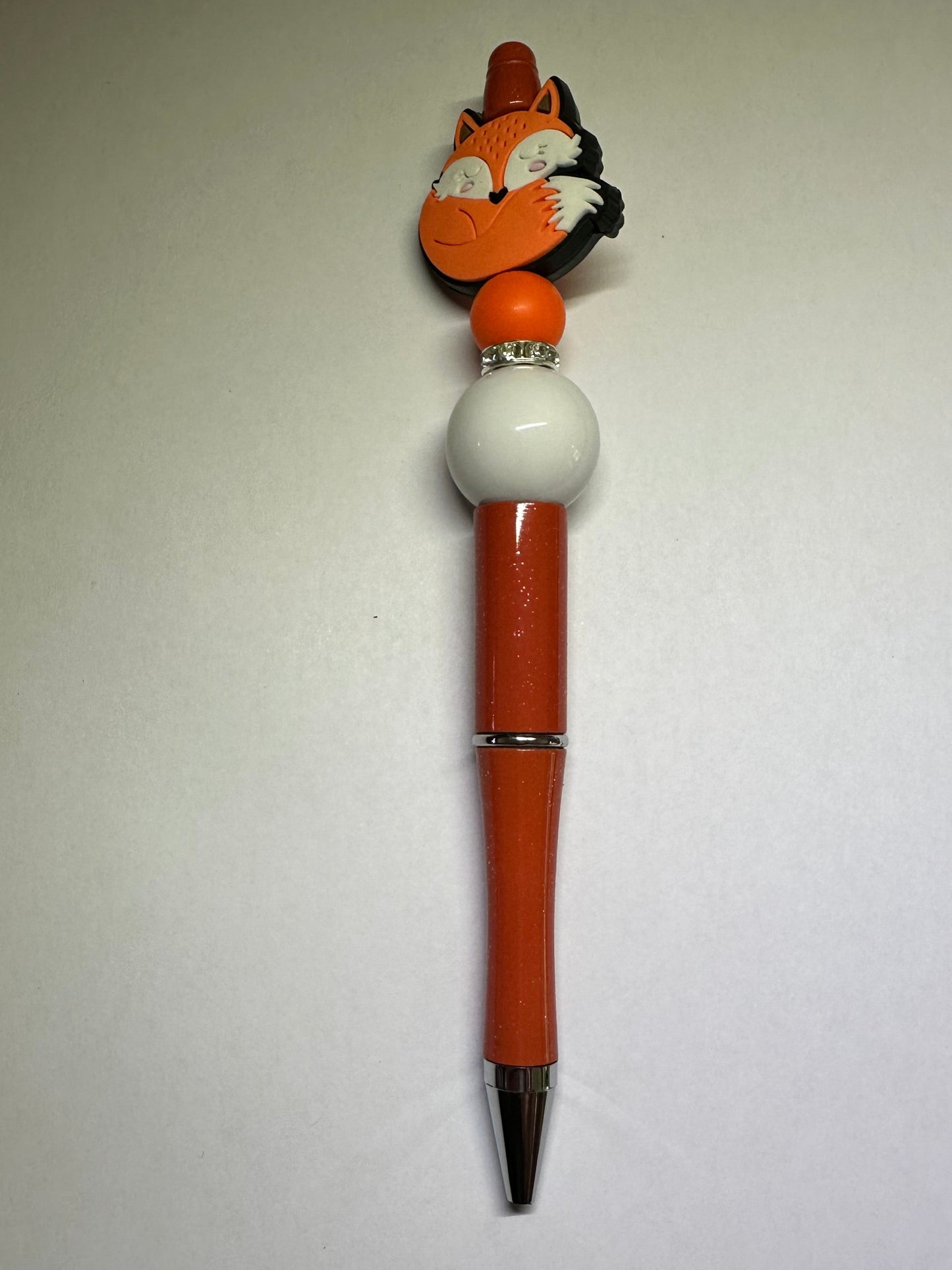 Sleeping fox orange and white