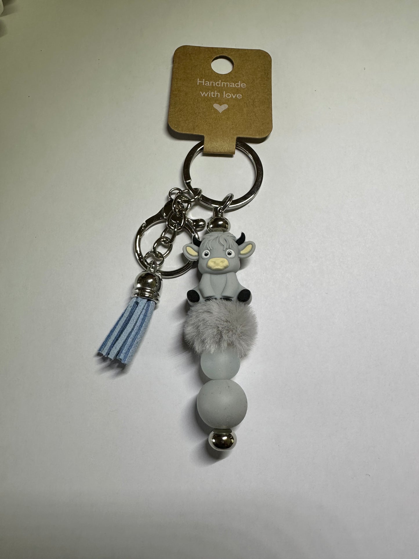 Grey Highland cow keyring