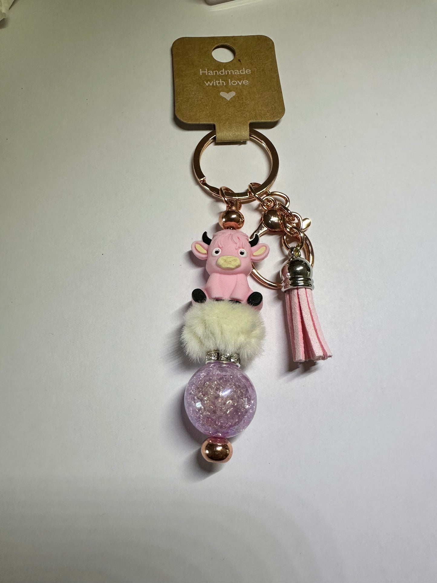 Pink Highland cow keyring with unicorn bead