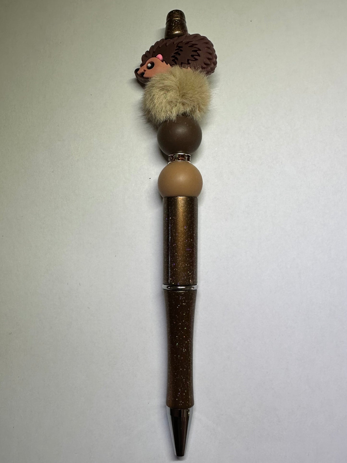 Brown hedgehog pen