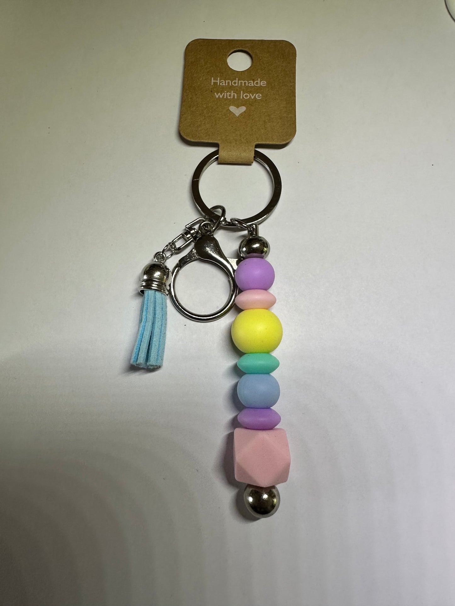 Geometric pastel keyring with mint tassel