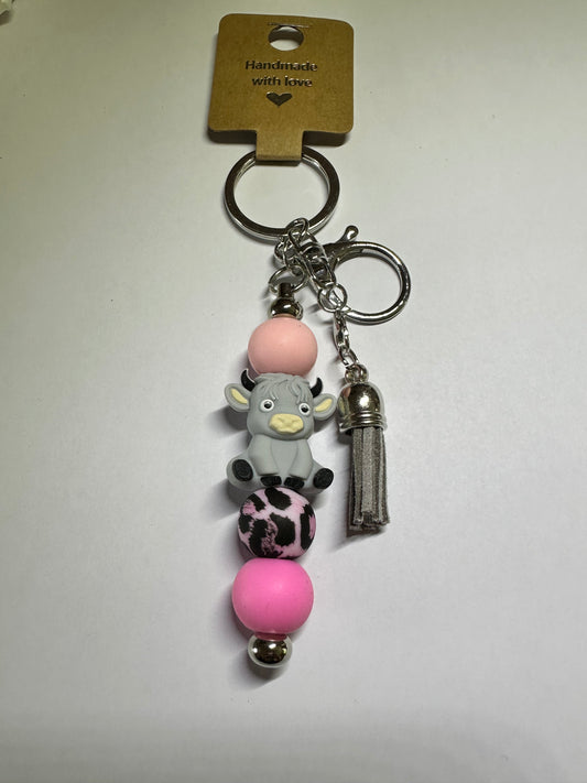 Grey and pink Highland cow keyring
